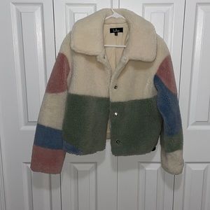 Teddy waist length coat. Multi colored.